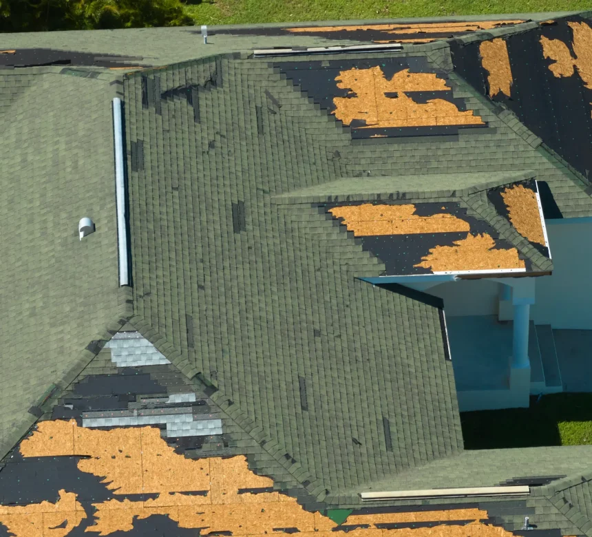wind-damaged-house-roof-with-missing-asphalt-shing-2024-12-07-02-39-37-utc